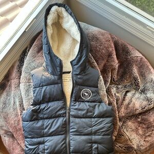 Abercrombie Kids Winter Puffer Vest. Size larger. Dark blue.